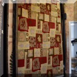 R100. Contemporary wool rug with leaf and flower design. Hand crafted in Nepal. 6' x 8'11”